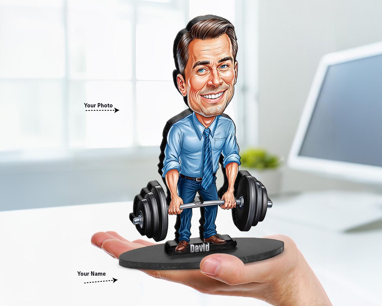 Big-head cartoon caricature of a male office worker in business attire lifting a heavy barbell β personalized motivational gift from photo.