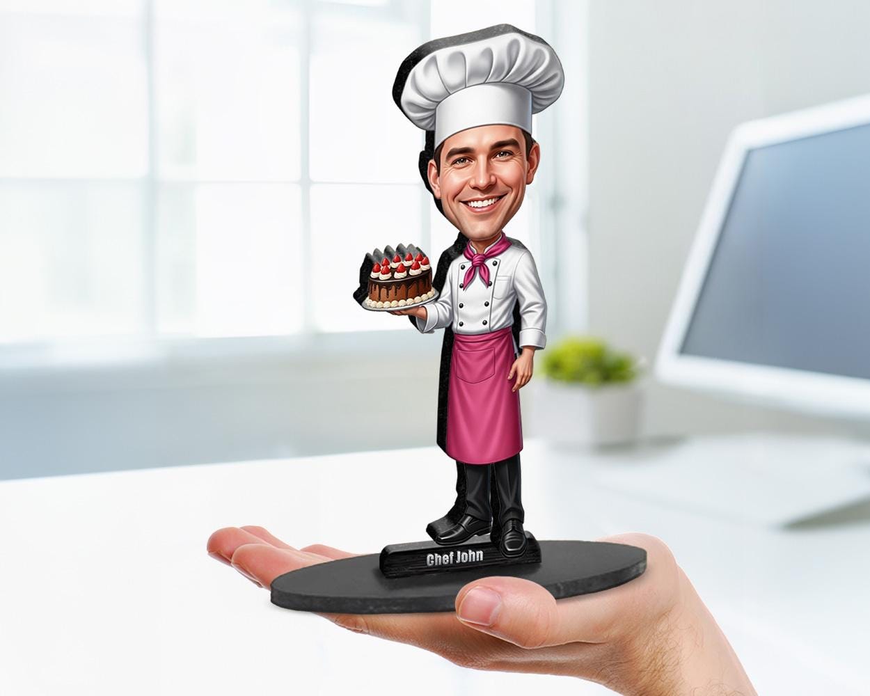 Big-head cartoon caricature of a male pastry chef, custom-made from a photo, printed on clear acrylic or mounted on a wooden base.