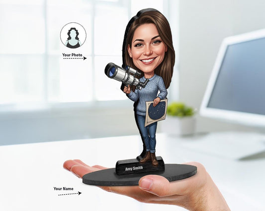 Big-head cartoon caricature of a female astronomer with telescope and star chart, custom-made from a photo, printed on acrylic or mounted on a wooden base.