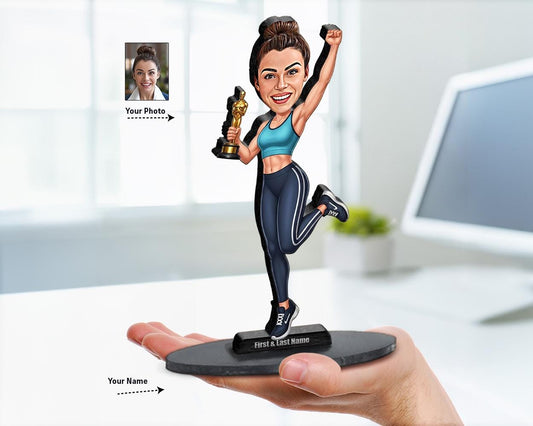 Big-head caricature of a female fitness champion holding a trophy, printed on wood or acrylic, standing pose with sportswear on white background.