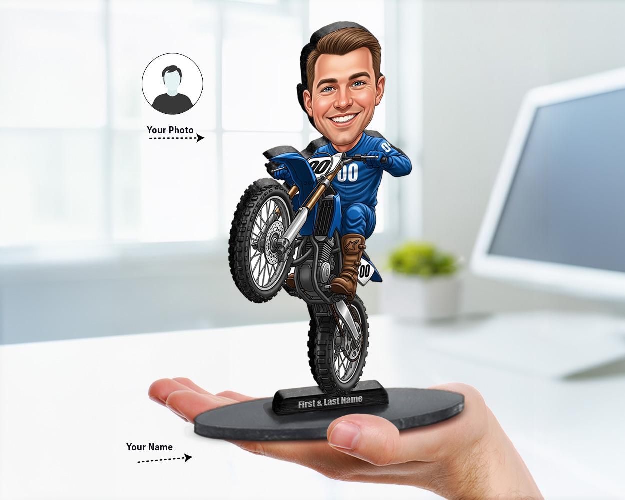Big-head caricature figurines of motocross riders in colorful outfits on dirt bikes, printed on wood or acrylic, standing poses, white background.