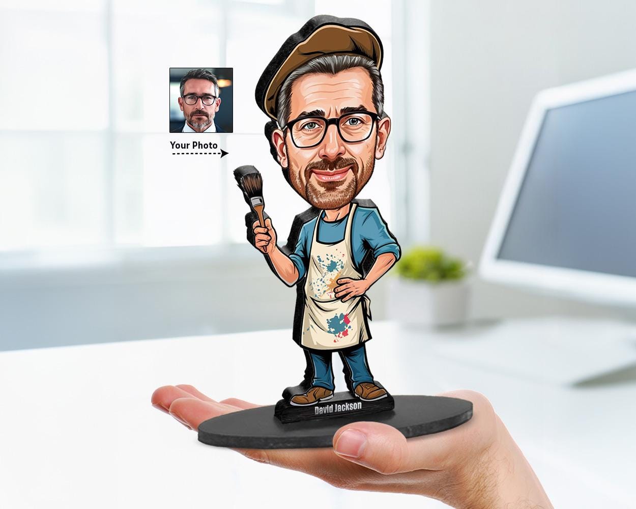 Big-head cartoon caricature of a male painter with apron and brush, custom-made from a photo, printed on clear acrylic or mounted on a wooden base.
