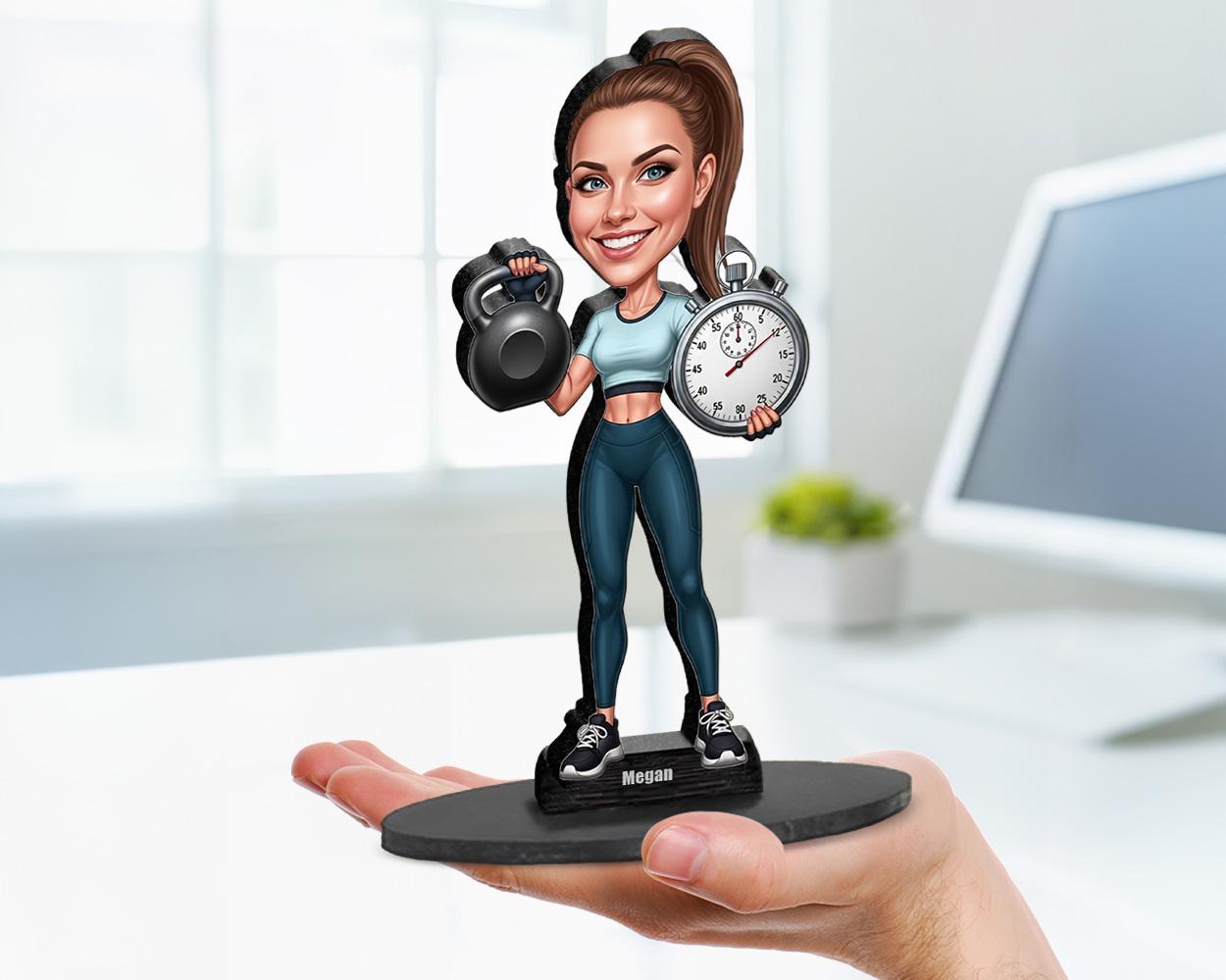 Big-head cartoon caricature of a female personal trainer, custom-made from a photo, printed on clear acrylic or mounted on a wooden base.