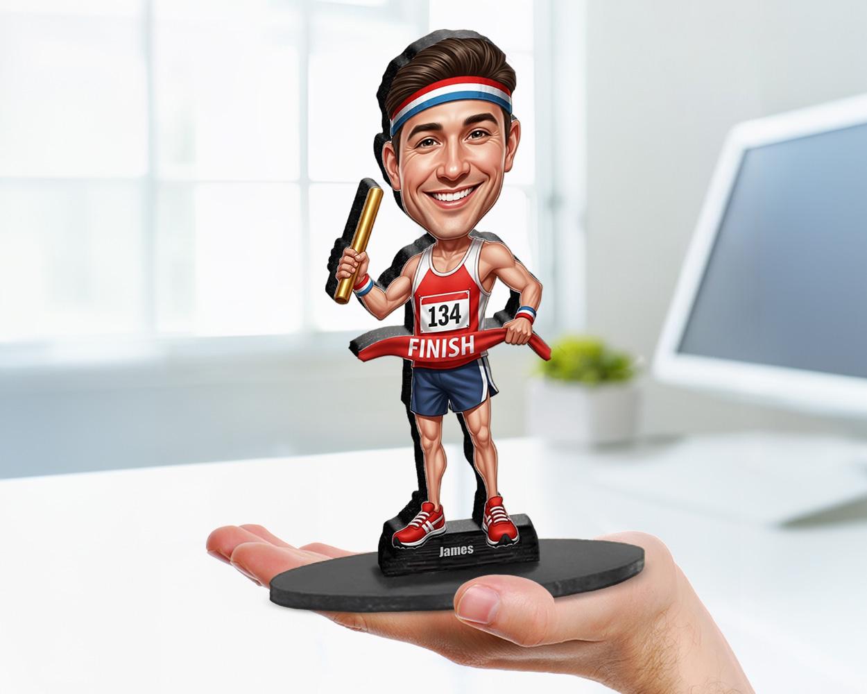 Big-head cartoon caricature of a male relay runner holding a baton, custom-made from a photo, printed on acrylic or mounted on a wooden base.